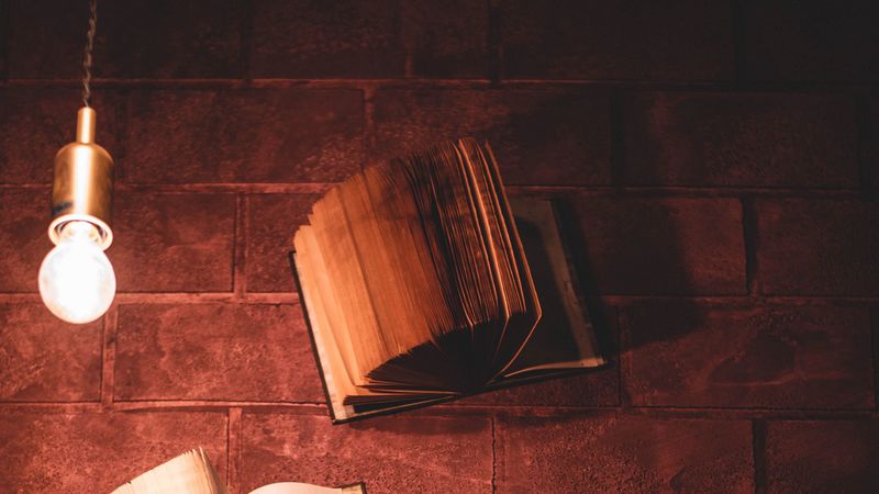 books, open books, wall, lamp, 4k