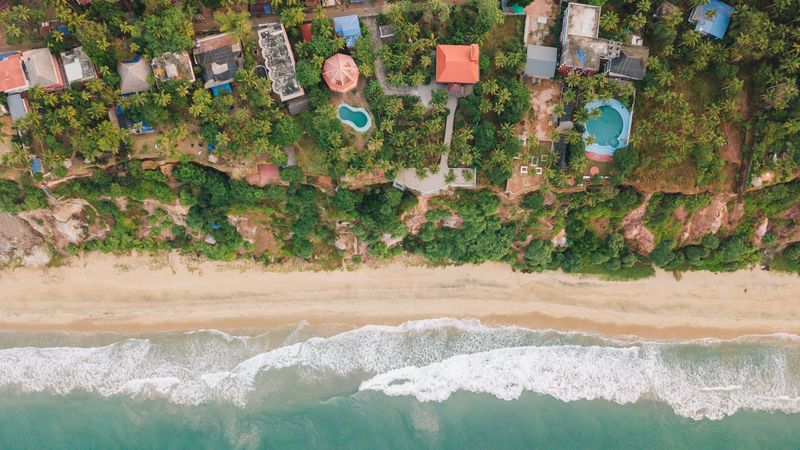 beach, coast, aerial view, buildings, palm trees, 4k