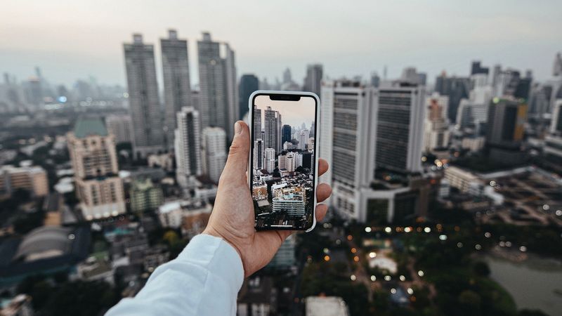 city, buildings, aerial view, hand, phone, overview, 4k