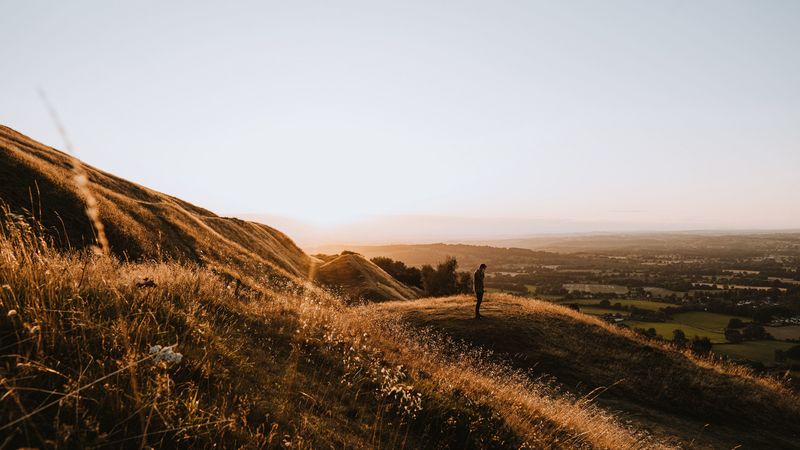 hills, man, silhouette, sunset, landscape, 4k