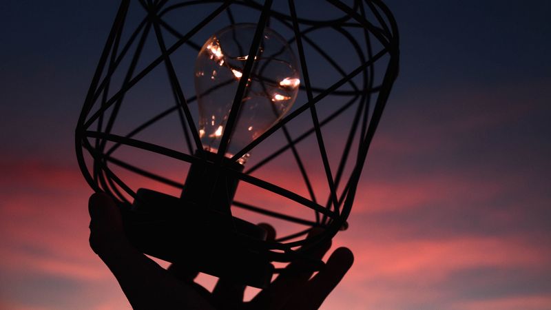 light bulb, lantern, hand, dark, dusk, 4k