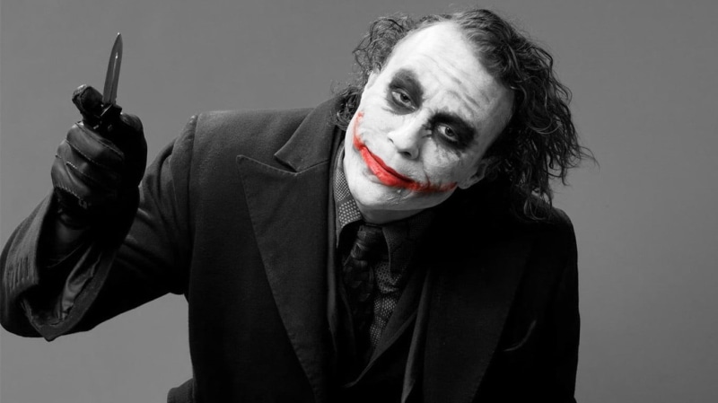 Joker, gray, Heath Ledger, front view, selective coloring, scarf, The Dark Knight, movies, looking at camera, one person, clothing, mammal, wall - building feature