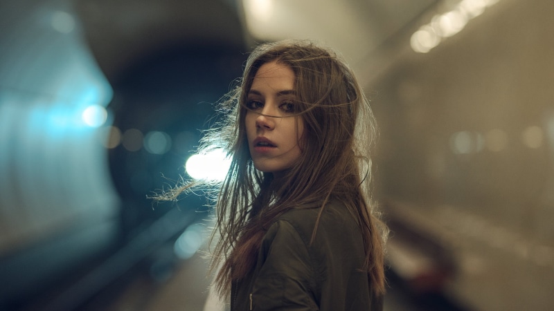 focus on foreground, brown Hair, real People, women, urban Scene, train, jacket, leisure activity, street, teenager, city Life, portrait, hair, transportation