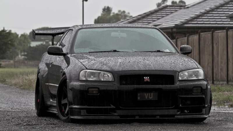 Nissan Skyline GT-R R34, car, outdoors, r, transportation, abandoned, obsolete, JDM, day, black, architecture, no people, mode of transportation, deterioration