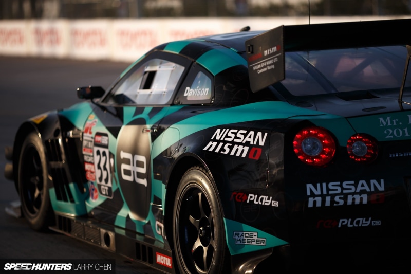 sports race, outdoors, r, professional sport, Nissan, communication, transportation, car, black, day, sign, land vehicle, no people, stock, text, competitive sport