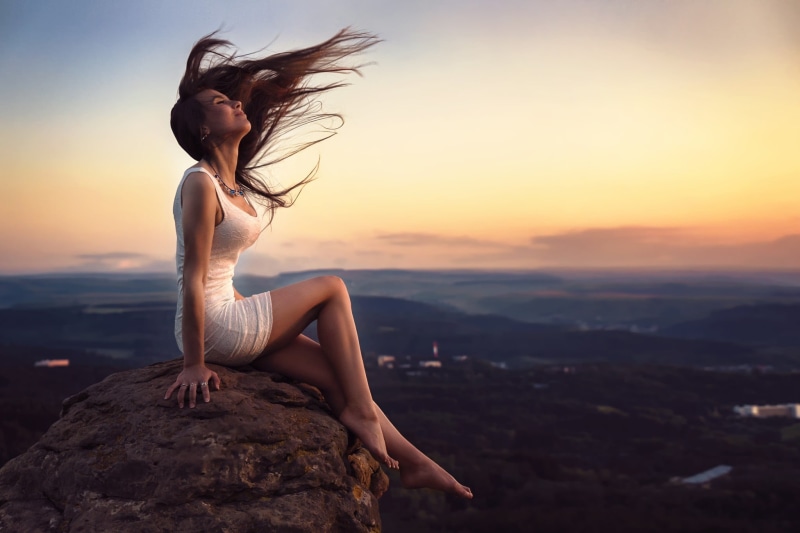 neck, white dress, barefoot, white, young women, leisure activity, orange color, rock - object, hairstyle, environment, nature, s, outdoors, bodycon, women
