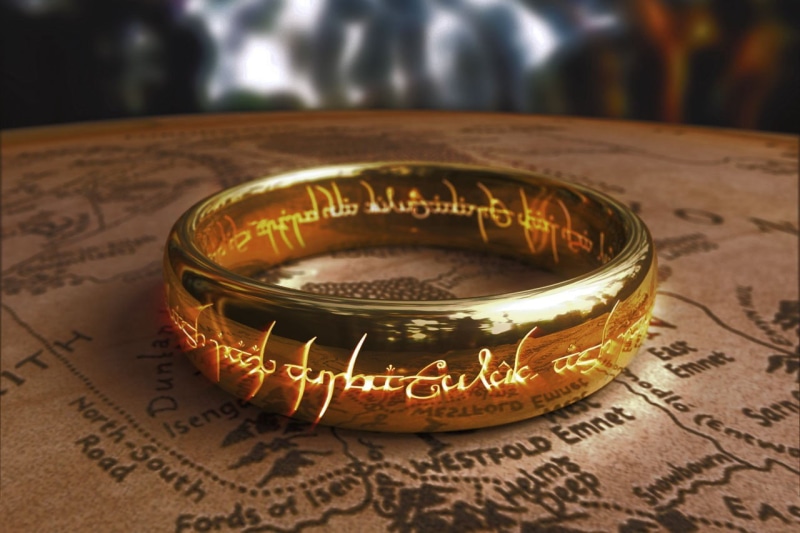 selective focus, 720P, gold, wealth, success, communication, finance, artwork, The Hobbit, still life, text, focus on foreground, shiny, table, rings