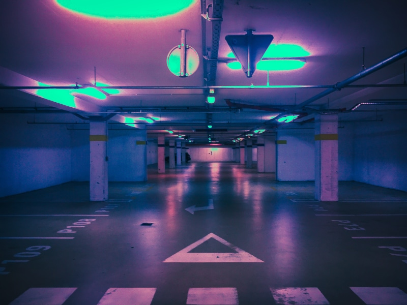 ceiling, built structure, lighting equipment, night, perspective, futuristic, architecture, symbol, architectural column, cyberpunk, 1980s, parking lot