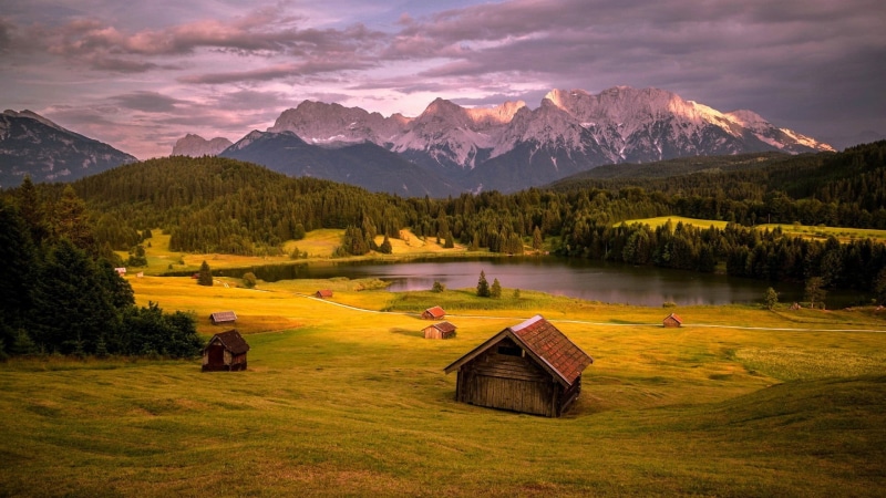 lake, surrounded, tranquil scene, trees, abandoned, no people, hills, sky, clouds, tranquility, mountain, snowy peak, mountains, land, pine trees, body