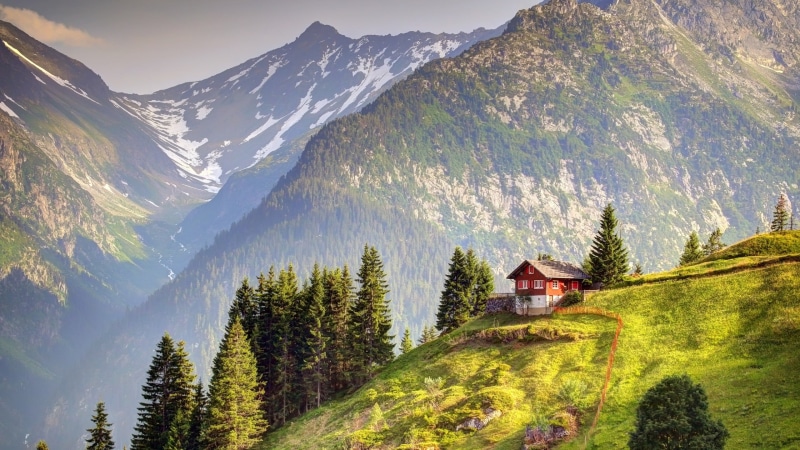 Switzerland, plant, built structure, white, outdoors, red, non-urban scene, tree, chalet, tranquility, building exterior, fence, environment, clouds, mountains