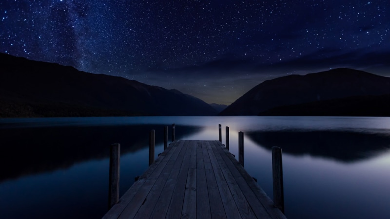 tranquil scene, pier, lake, beauty in nature, star, star field, space, reflection, water, space and astronomy, milky way, tranquility, night sky, nature