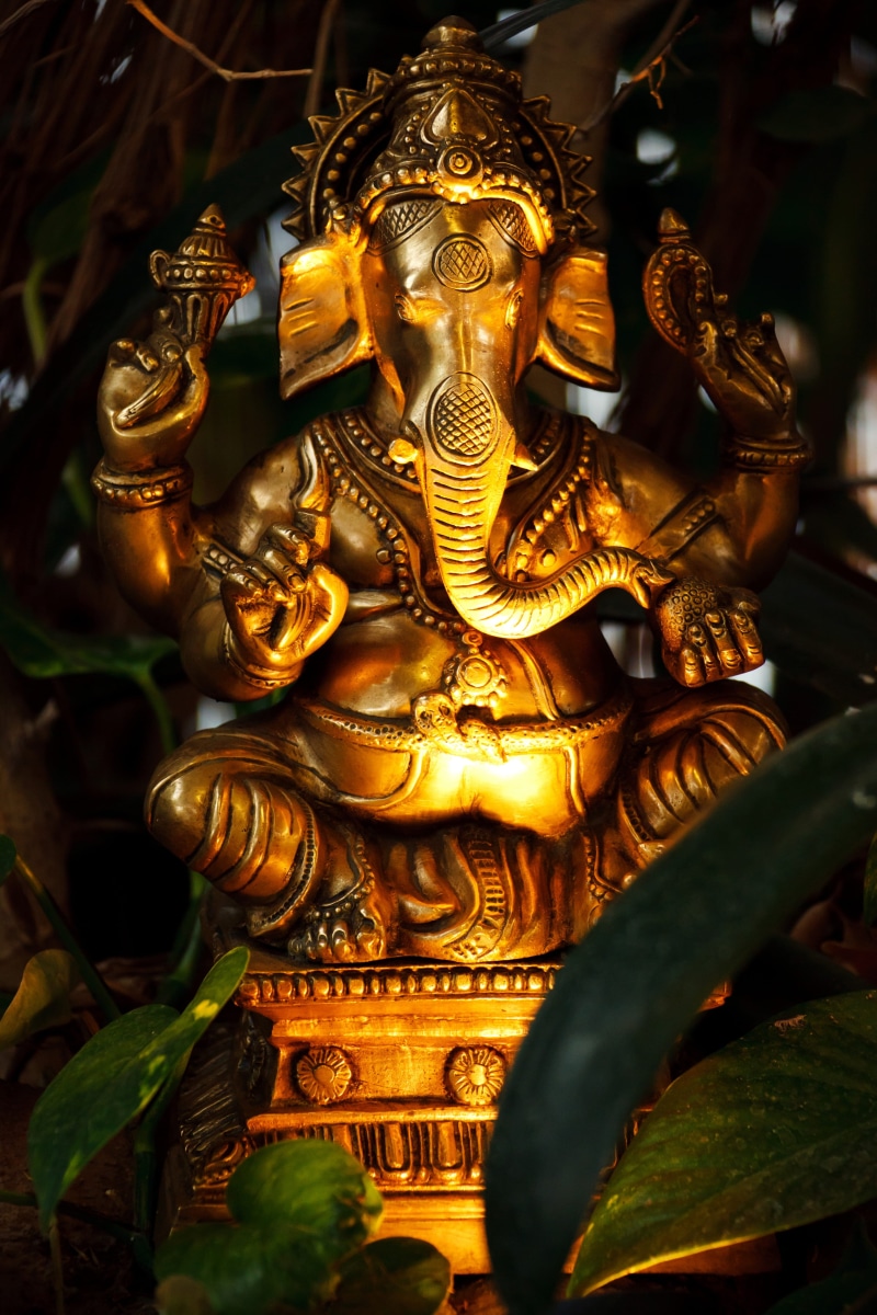 no people, sculpture, gold colored, architecture, icon, gold, hinduism, craft, representation, face, ornate, hindu, place of worship, india, ganesh, religious