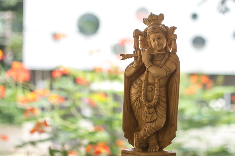 hindu, religion, close-up, ornate, female likeness, human representation, craft, spirituality, no people, lord, flute, statue, creativity, focus on foreground