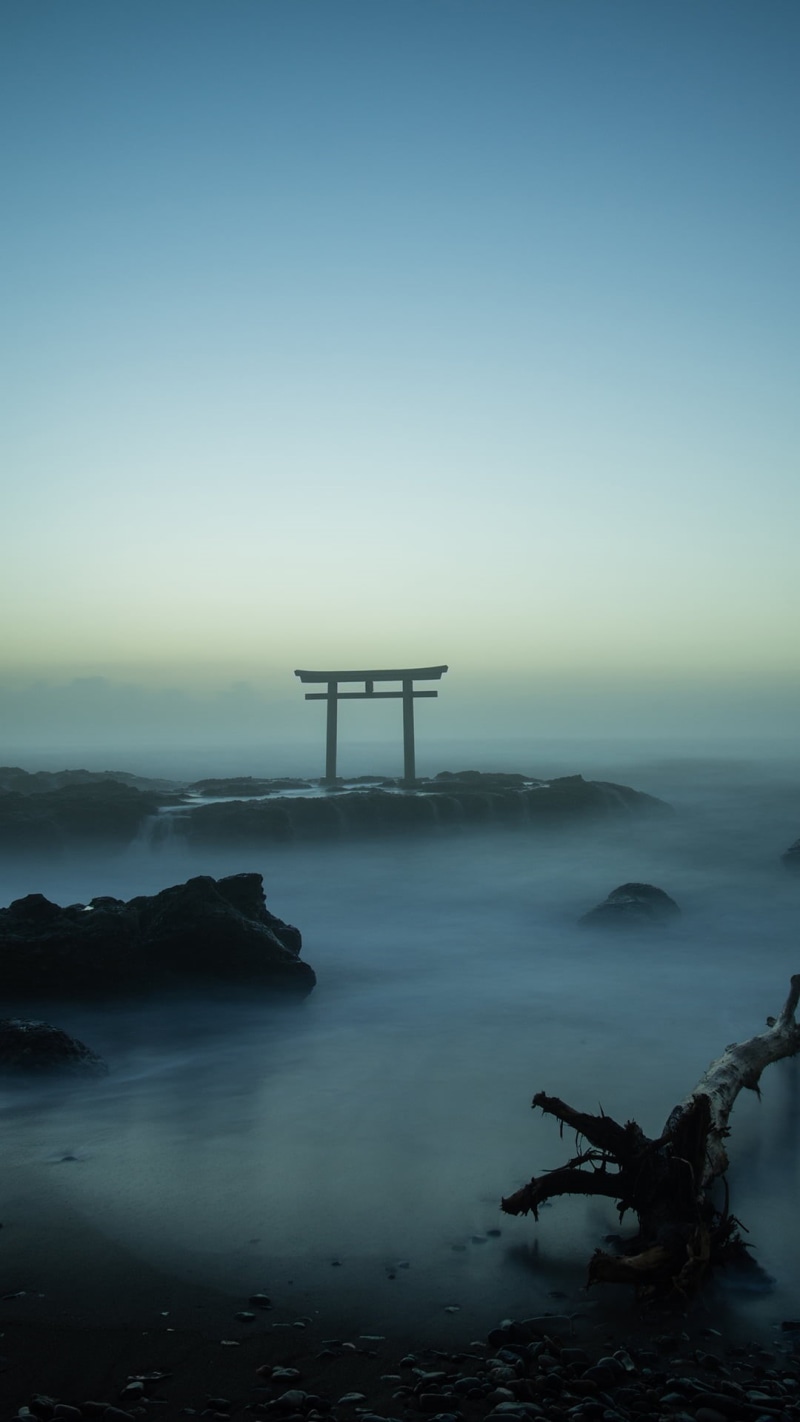 photo, non-urban scene, copy space, outdoors, rock, landscape, beach, aerial, dead trees, tranquil scene, mist, built structure, stones, torii, fog, sea