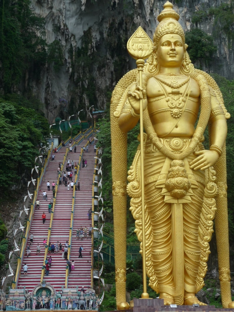 selangor, place of worship, sculpture, built structure, golden statue, plant, gold colored, batu caves, spirituality, architecture, stairs, human representation