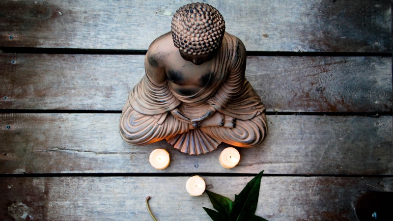 day, sculpture, no people, candle, mood, buddha, tibetan, wall - building feature, flooring, art and craft, spirituality, buddhism, representation, male likeness