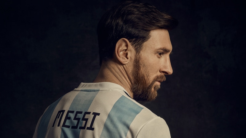 facial hair, studio shot, Messi, indoors, looking away, looking, black background, Lionel, k, contemplation, portrait, close-up, one person, headshot, 4K