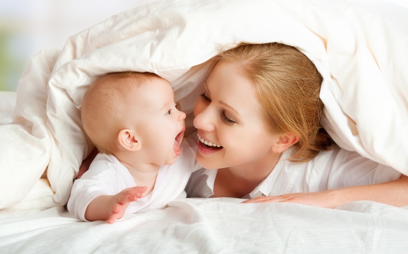 togetherness, real people, bed, lying down, child, Baby Beach, s, females, emotion, hair, positive emotion, love, bonding, childhood, onesie, furniture