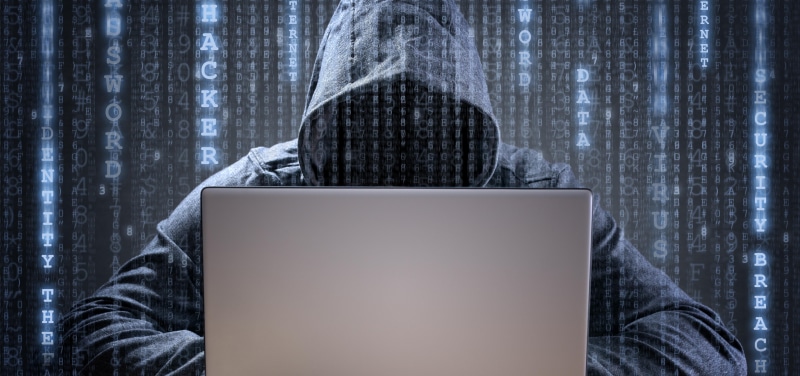 hood, adult, indoors, laptop, clothing, front view, hood - clothing, communication, computer, men, hacker, connection, unrecognizable person, using laptop