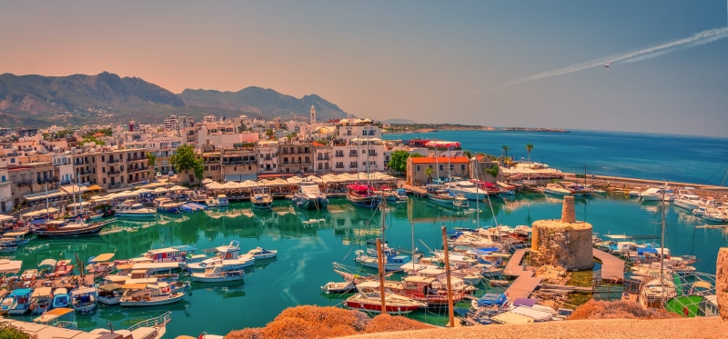 cityscape, sea, land, nature, mode of transportation, north cyprus, architecture, building, beach, sky, cypress, mountain, port, built structure, no people