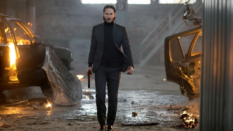 looking at camera, screenshot, real people, fire, young adult, john, burning, portrait, Keanu Reeves, still, illuminated, indoors, 1080P, standing, fire - natural phenomenon