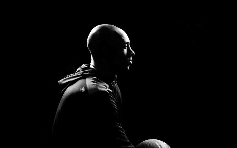 men, bryant, kobe, black background, portrait, contemplation, sitting, nba, indoors, young adult, lifestyles, looking, studio shot, copy space, shaved head