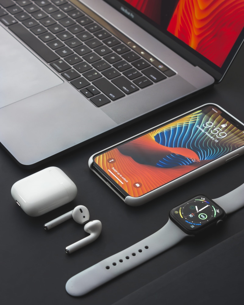 table, metal, laptop, close-up, case, still life, indoors, charging, airpods, space, computer key, high angle view, iphone, turned, wireless technology