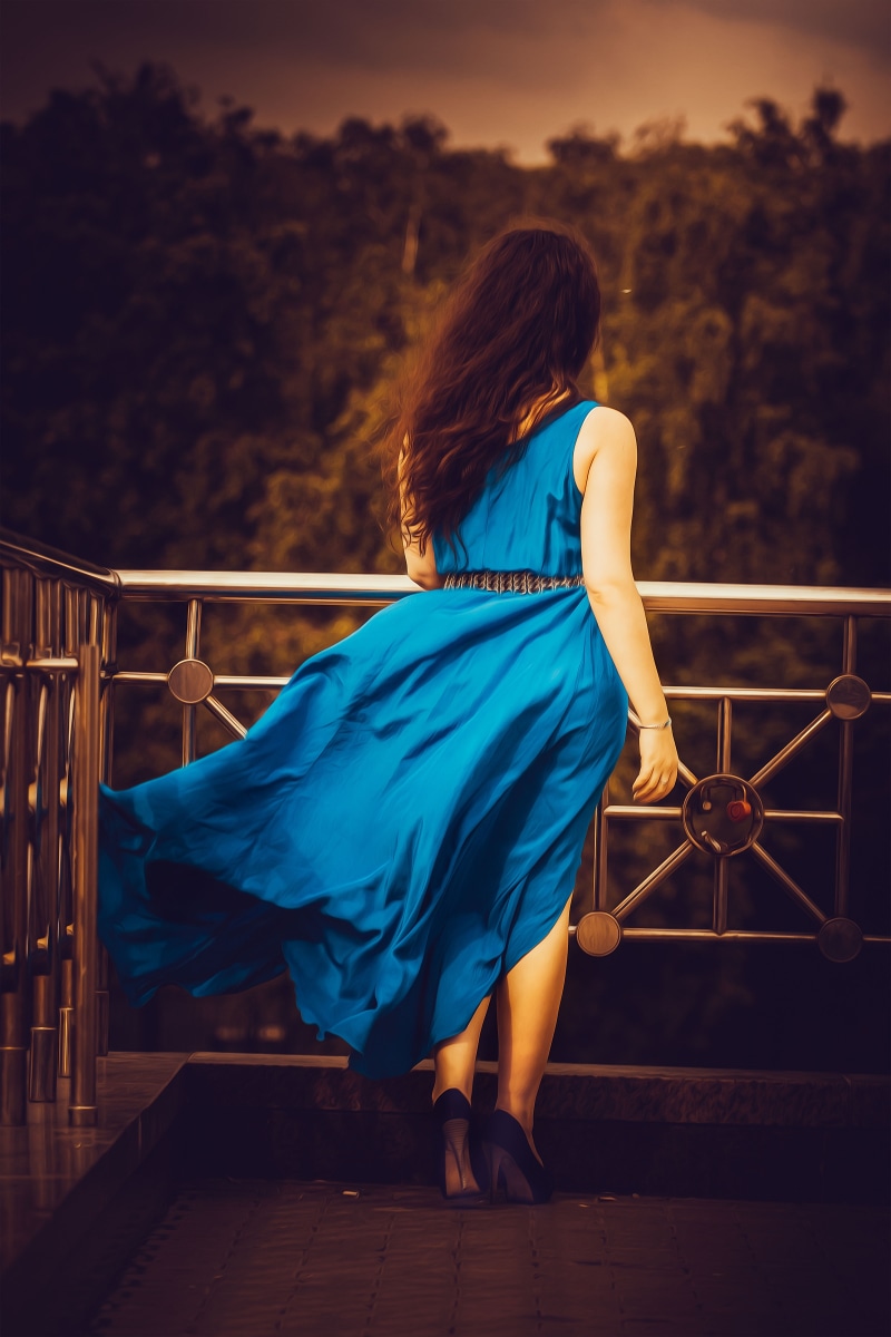 clothing, architecture, emotions, dark background, adult, rear view, model, length of dress, female hands, dress, railing, girl in blue dress, one person