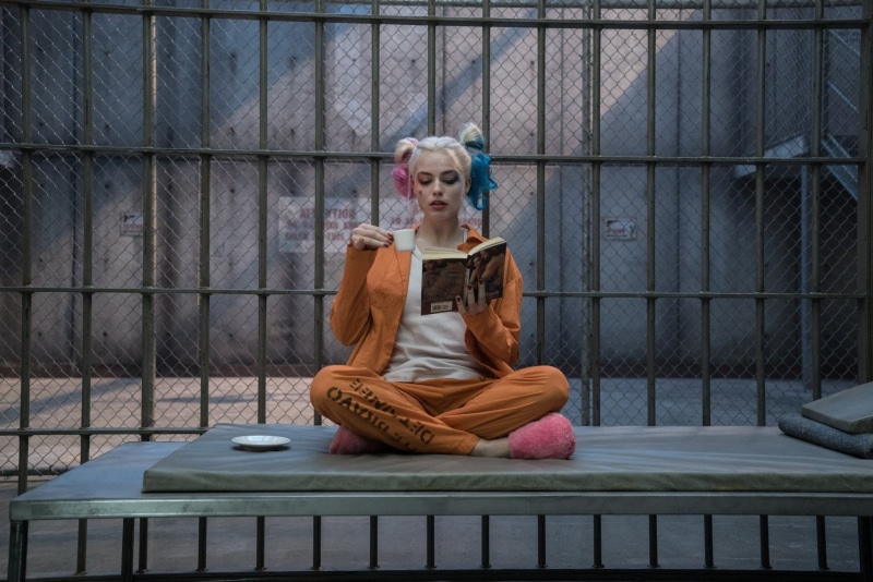 seat, people, stuffed toy, outdoors, females, cross-legged, spirituality, sitting, harley, mammal, container, clothing, Suicide Squad, quinn, no people