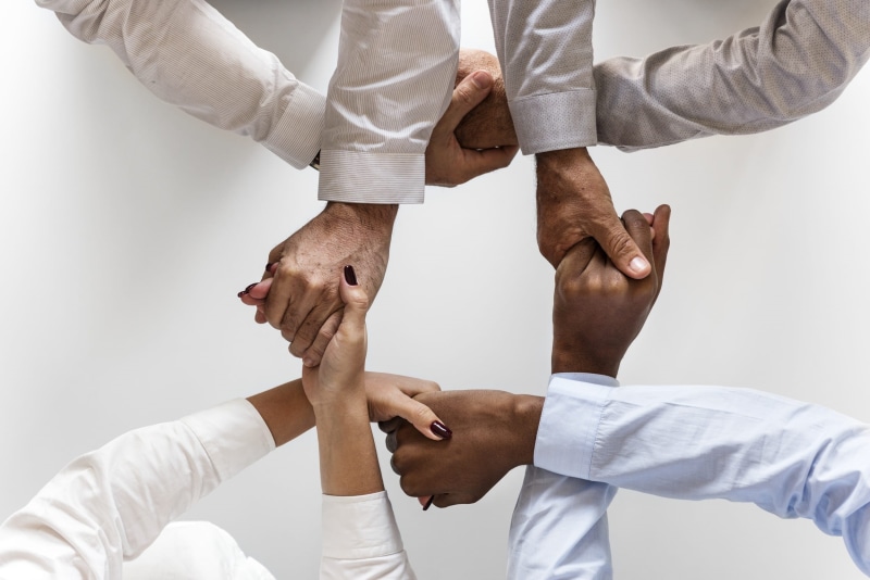business person, caucasian, goals, african, planning, teamwork, african american, people, coworker, target, challenge, human limb, development, standing