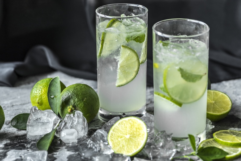 ice cube, refreshing, tropical, lemon, juice, green, two, glass, citrus, lime juice, cold drink, nutritious, natural, healthy, cool, organic, drinking glass