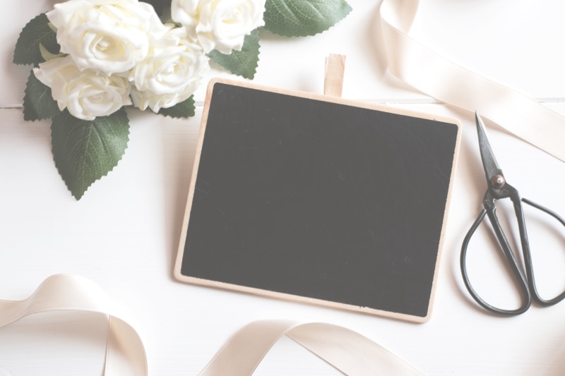 copy-space, decorative, flower arrangement, frame, surface, flowering plant, lifestyle, marriage, space, board, canvas, black, creative, indoors, white background