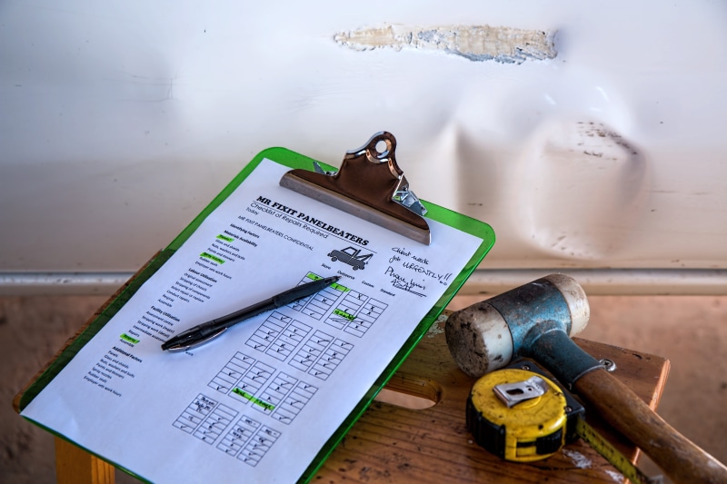 indoors, no people, loss, business, directly above, connection, vehicle, work tool, table, checklist, wireless technology, tape, auto accidents, metal