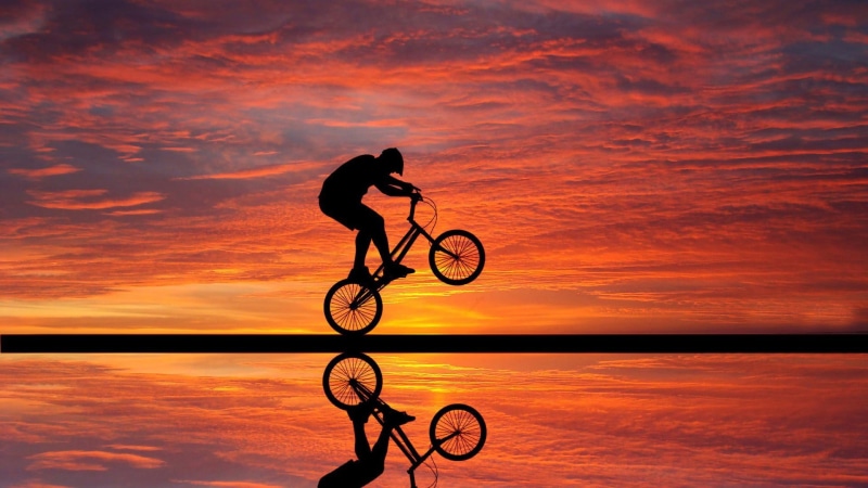 sunset, one person, sky, lifestyles, side view, orange color, ride, 1080P, outdoors, healthy lifestyle, transportation, water, Wheelie, bmx, cloud - sky
