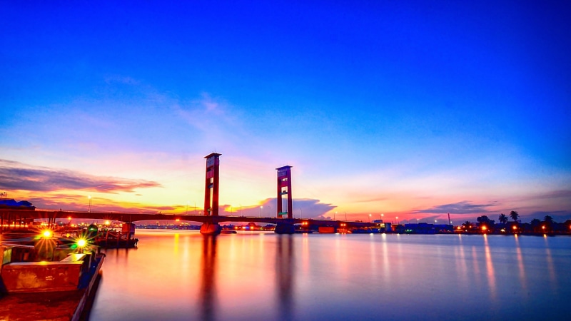 sumatra, city, sunset, fuel and power generation, blue, building exterior, pollution, night, built structure, bridge, no people, river, dusk, ampera bridge