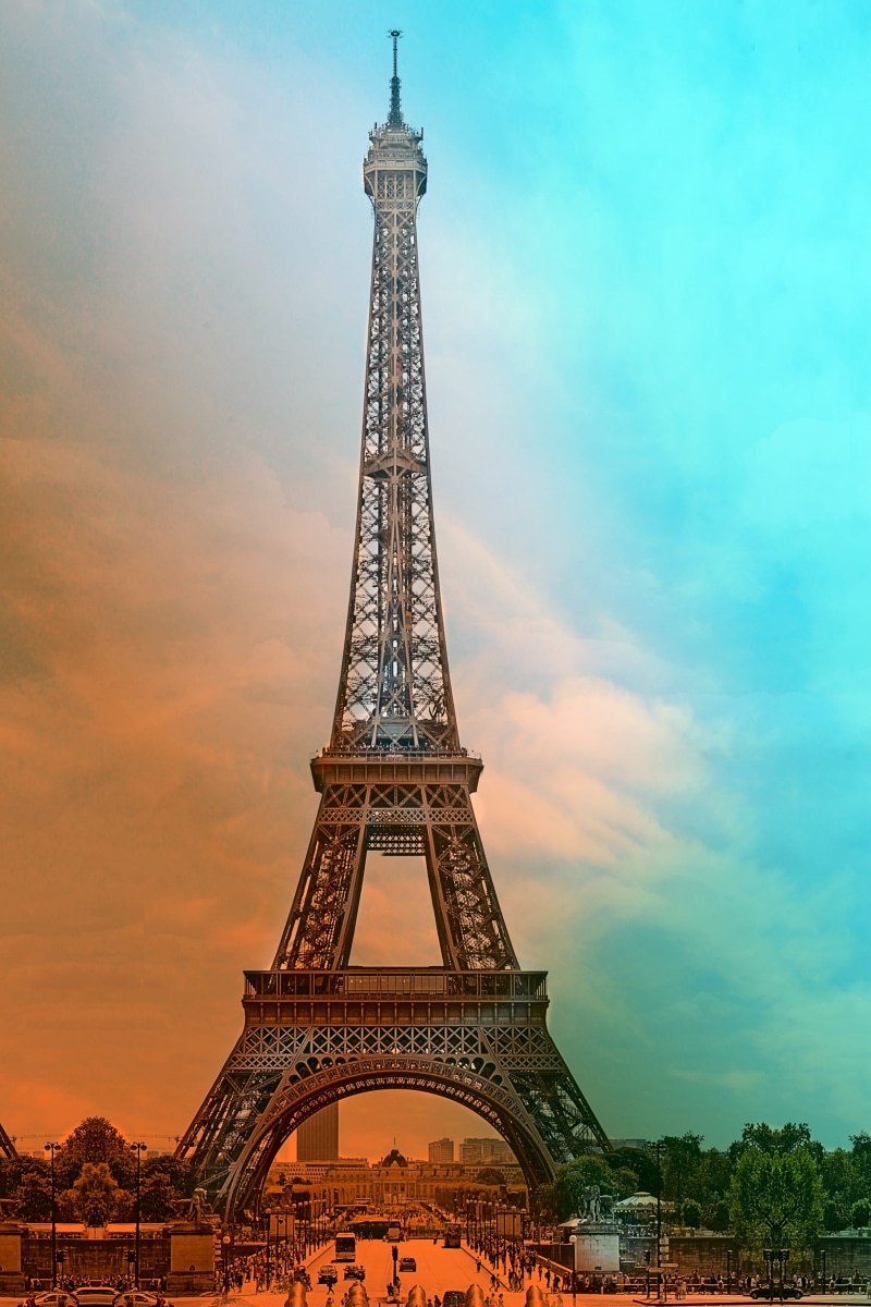 eiffel tower, spire, building exterior, city, tower, nature, outdoors, paris, built structure, the past, low angle view, sights, cloud - sky, tourism, history