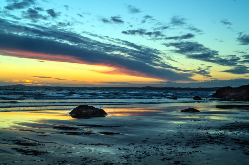 body of water, sun, sand, beach  sand, twilight, Falling, sea, rocky, pembrokeshire, rocks, 5K, clouds, coastline, sunlight, orange, wave, sky, outdoors