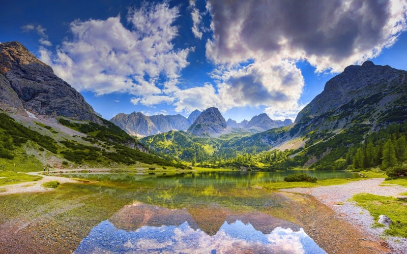 environment, mountain, clouds, forest, cloud - sky, lake, mountains, tranquility, rock, sky, idyllic, reflection, non-urban scene, ahead, mountain peak
