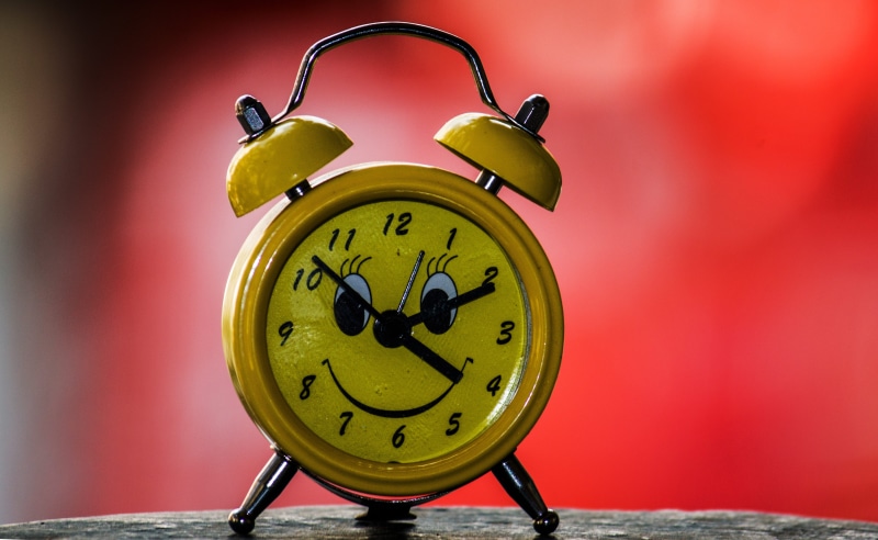 focus on foreground, retro styled, single object, minute hand, close-up, information, colored background, number, green color, time zone, globe, time, no people