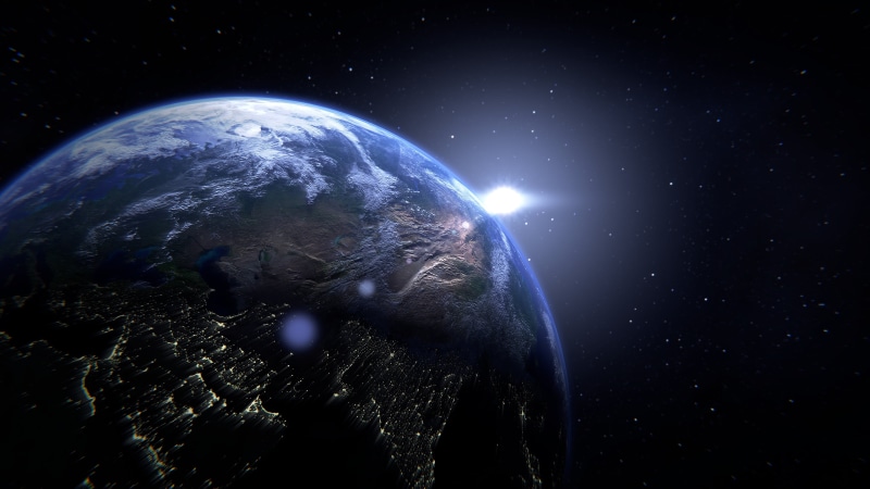 lens flare, outdoors, earth, beauty in nature, planet, sphere, satellite, light, science fiction, continents, astronomy, nature, light - natural phenomenon