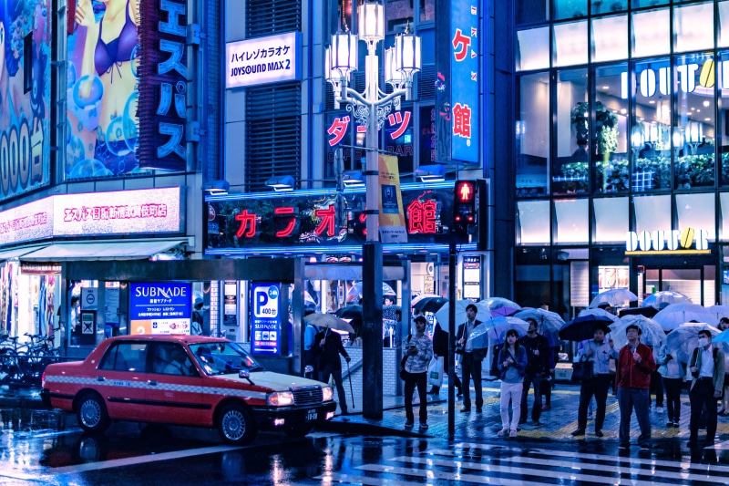 neon, blue, street, people, wet, commercial sign, car, rain, crossing, transportation, japanese, near, built structure, building, landscape, lane, crowd