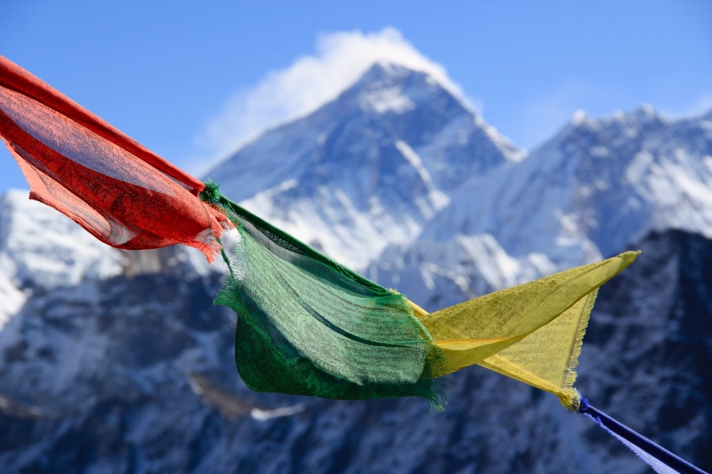 himalayas, snow, focus on foreground, leaf, Om mani padme hum, everest, blue, environment, flag, outdoors, green, beauty in nature, mountain peak, landscape