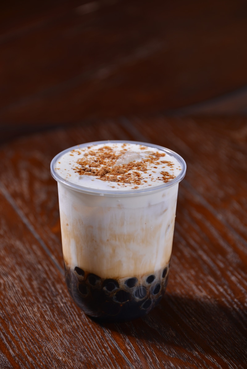 food and drink, refreshment, table, taiwan tea, latte, tea, milk tea, hot drink, coffee cup, indoors, coffee - drink, food, brown sugar, wood - material