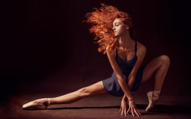 hair, beauty, exercising, top, young women, stretching, clothing, beautiful people, wavy hair, strap, young adult, black, splitting, blue dress, full length