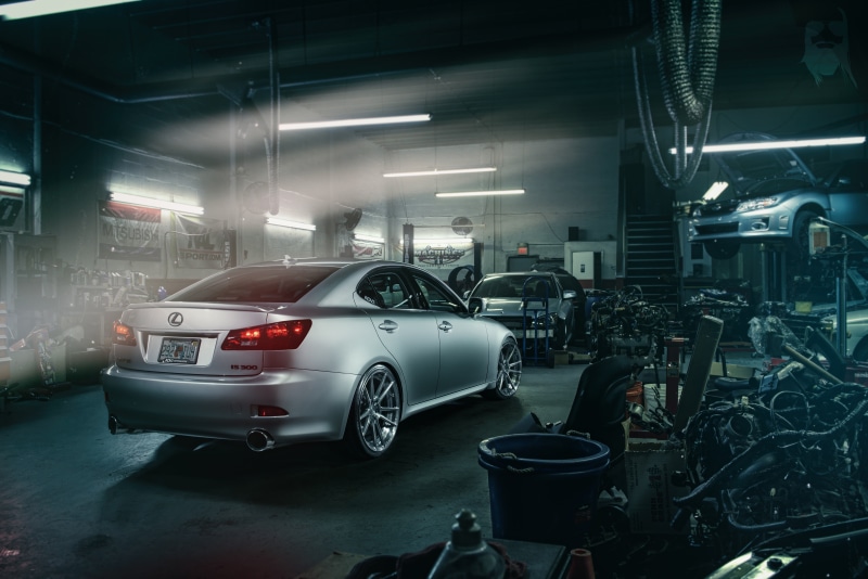 lighting equipment, parking, silvery, lift, domestic room, no people, mode of transportation, garage, parking lot, illuminated, land vehicle, indoors, Lexus