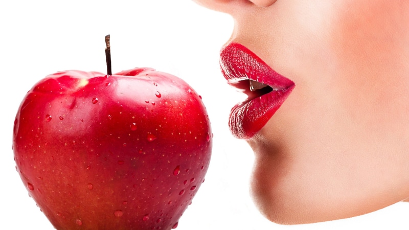 one person, lips, lipstick, glowing, open mouth, close-up, indoors, beautiful woman, apples, food, white background, water drops, closeup, body part, women