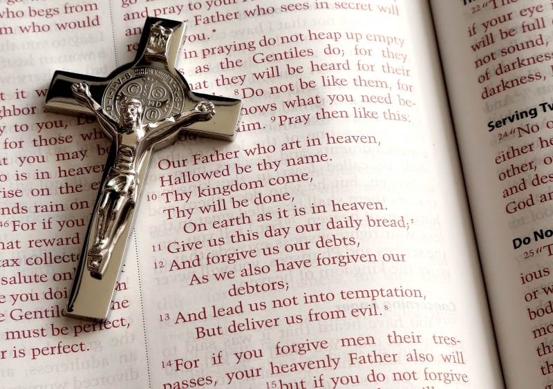 silver colored, god, spiritual, belief, bible, no people, rosary, western script, holy, book, indoors, open, colored, paper, crucifix, religious, black