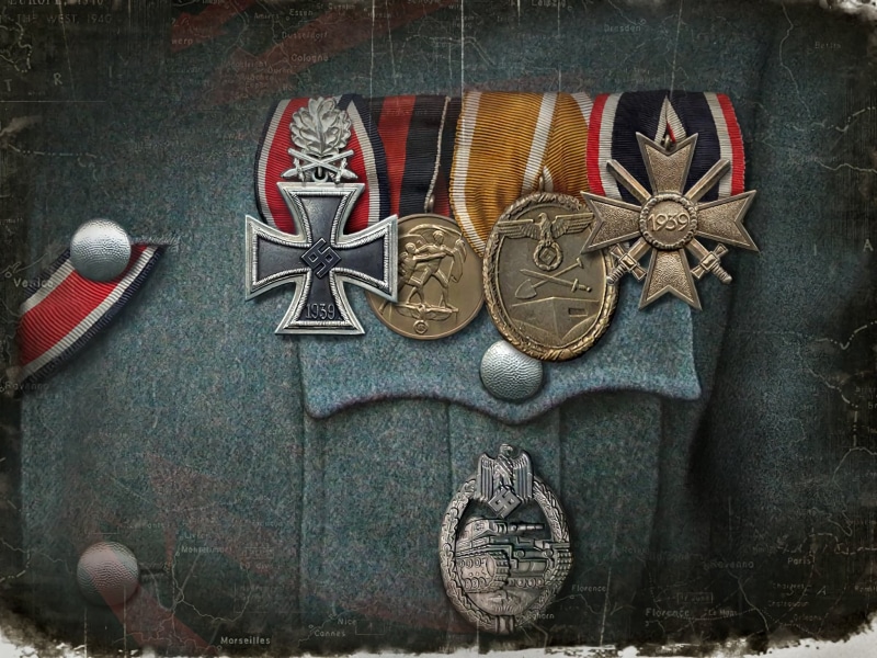 wall - building feature, still life, uniform, art and craft, floral pattern, no people, craft, close-up, creativity, Iron Cross, representation, World War II