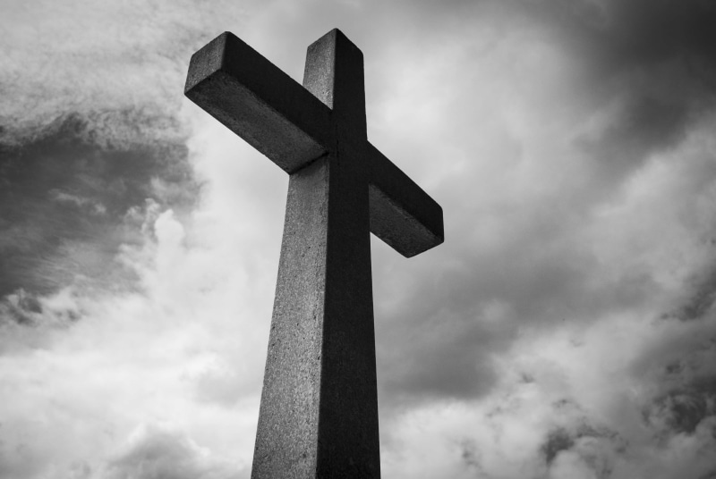 cemetery, belief, sky, nature, outdoors, clouds, day, cross, god, crucifix, low angle view, cross shape, cloud - sky, spirituality, dark, symbol, black and white