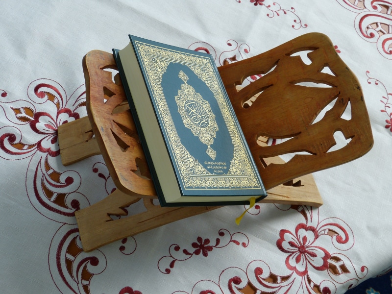 freshness, holder, directly above, temptation, religion, wooden, brown, wood - material, communication, hardbound, cutting board, no people, floral pattern